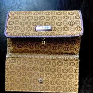This wallet has never been used.  Beautiful addition to your daily wardrobe